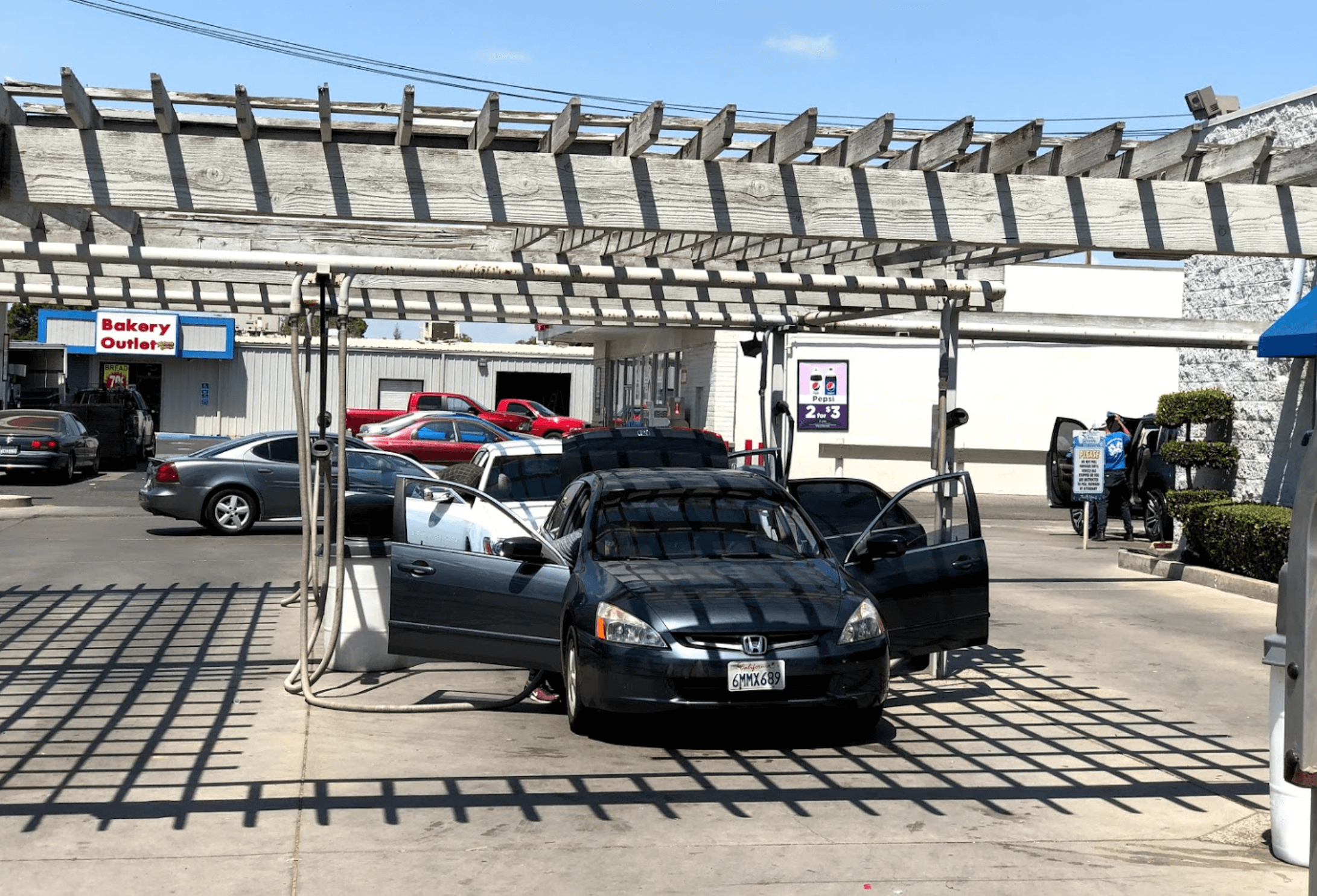 Cars being vacuumed